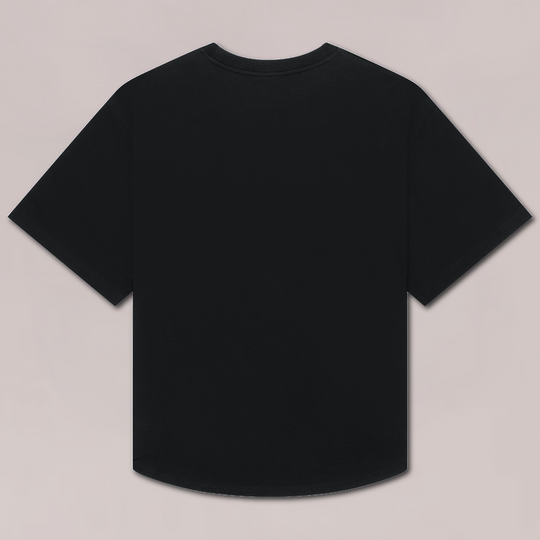 Achteraanzicht van zwarte oversized T-shirt voor heren van Muscle Up Store met minimalistische look, verlaagde schouders en premium zwaar katoen.